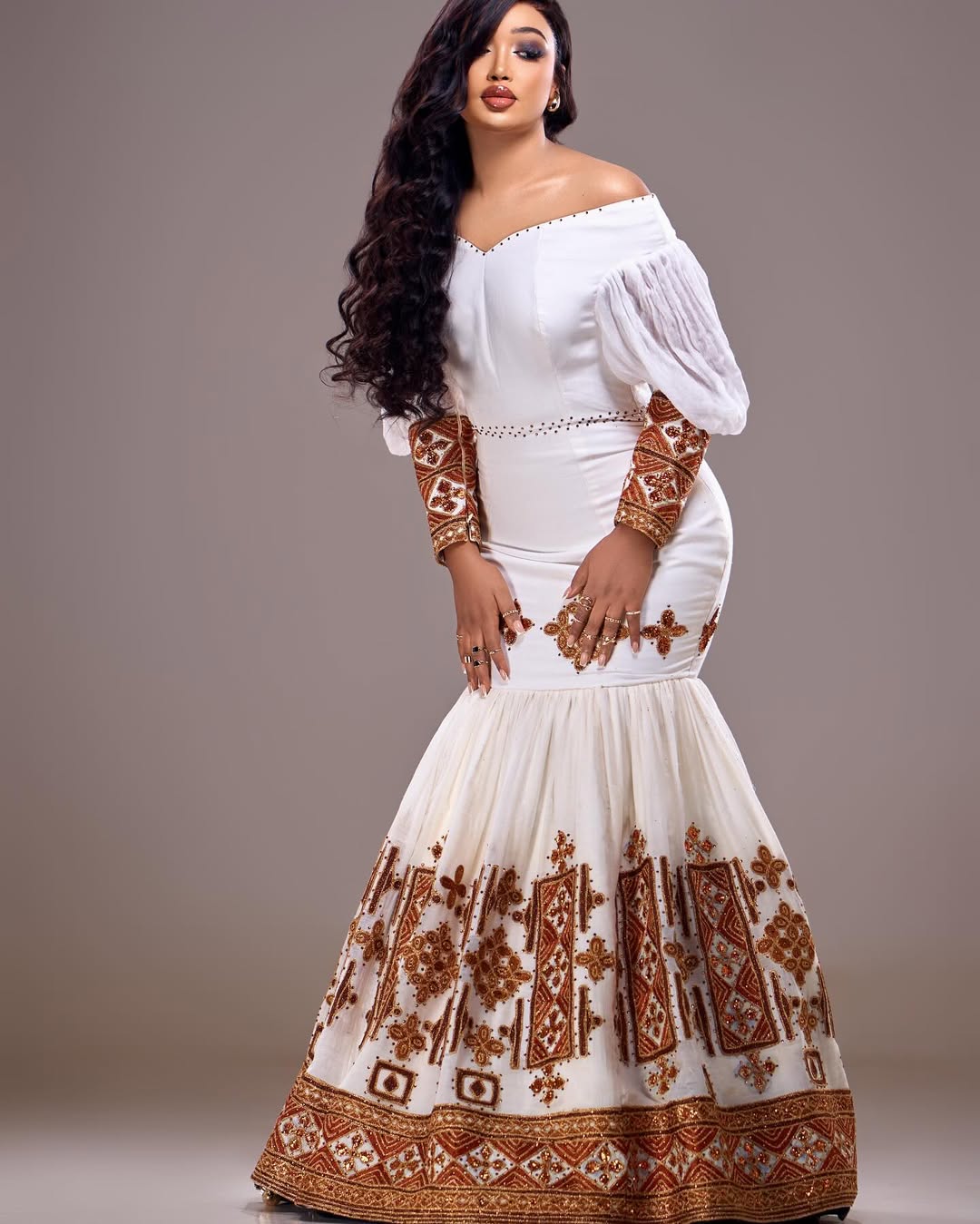 Captivating Mermaid Light Brown Traditional Dress: Golden Handstitched Ornaments Along Habesha Clothing Modern Ethiopian Clothing