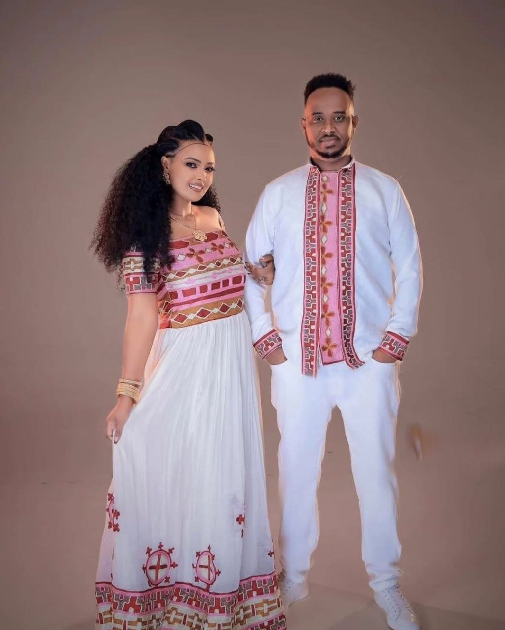 Striking Couple's Habesha Dress Set with Bold Red, Pink & Gold Embroidery