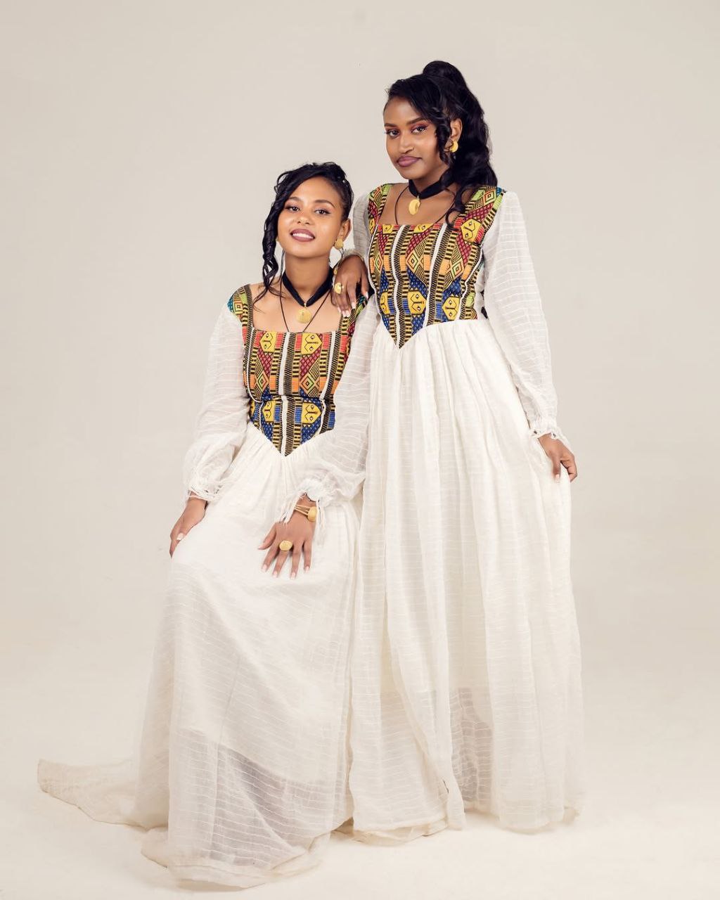 Stylish Habesha Dresses with Colorful Neck Embroidery and Ethiopian Motifs for Occasions