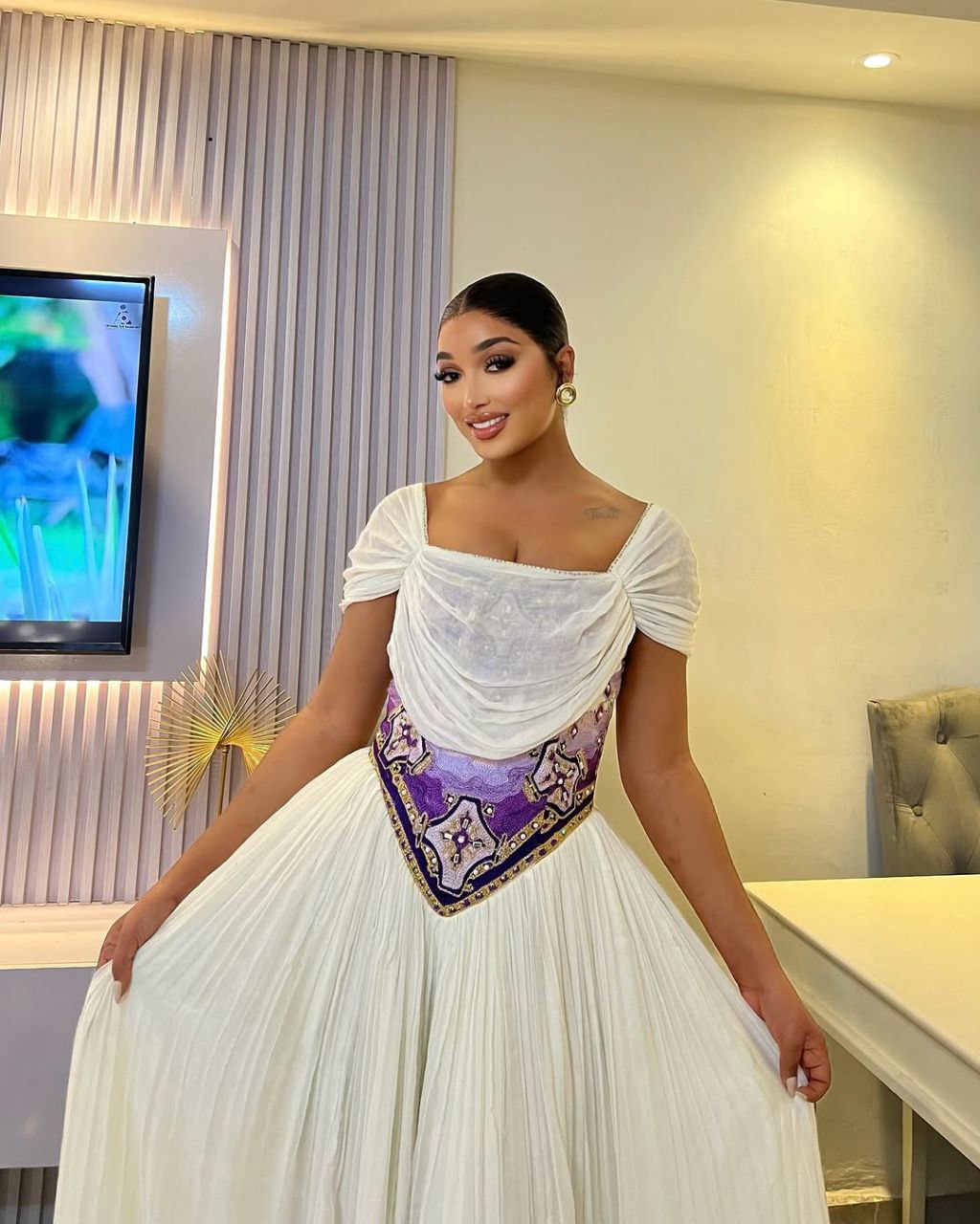 Timeless Habesha Kemis with Vibrant Purple Accents for Lasting Style