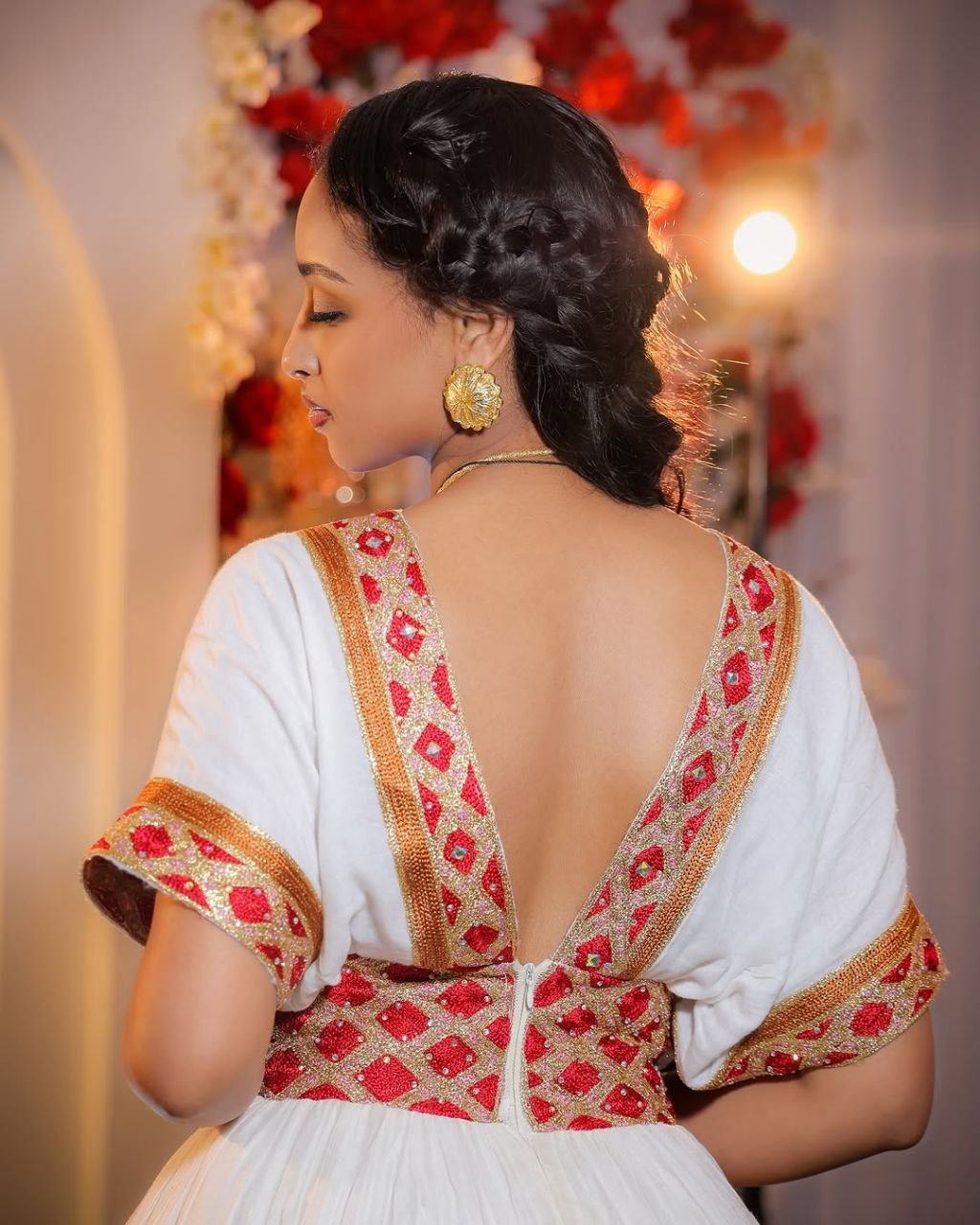 Modern Habesha Wedding Dress: Glowing in Radiant Red and Golden Embroidery