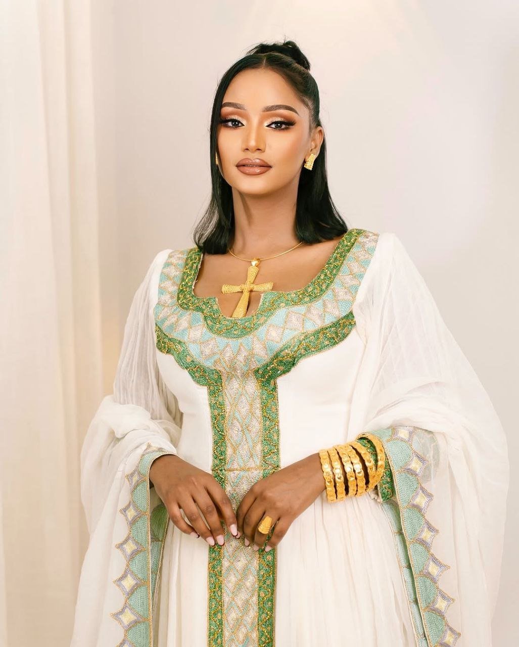 Graceful Traditional Ethiopian Dress with Green & Gold Cross Embroidery for Celebration