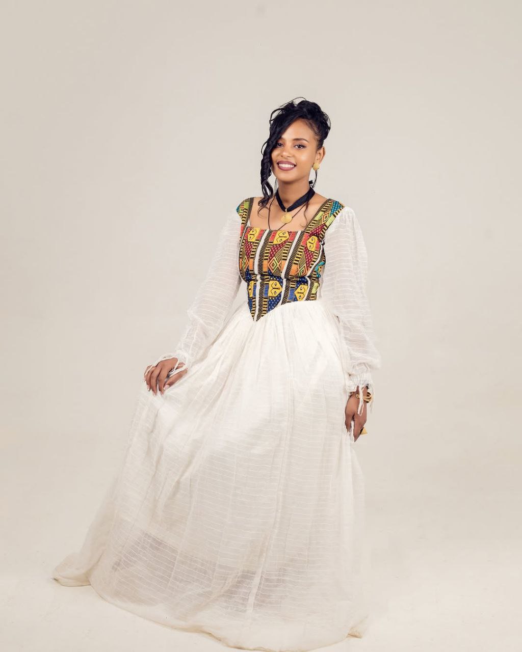 Stylish Habesha Dresses with Colorful Neck Embroidery and Ethiopian Motifs for Occasions