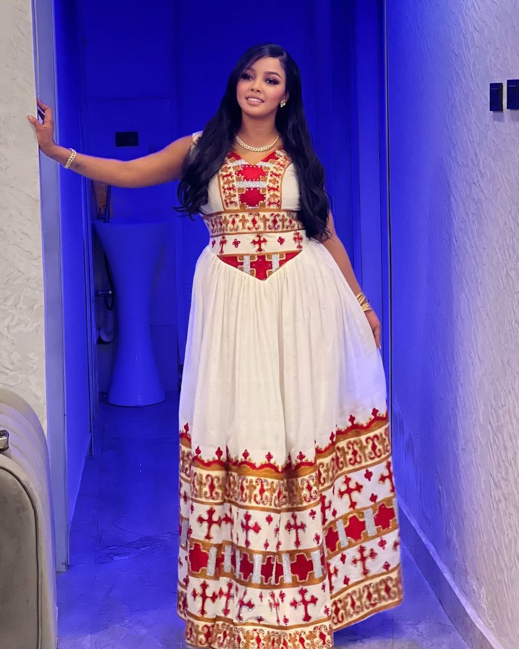 Beautiful Sleeveless Habesha Dress with Intricate Red and Gold Design Ethiopian Dress For Weddings.