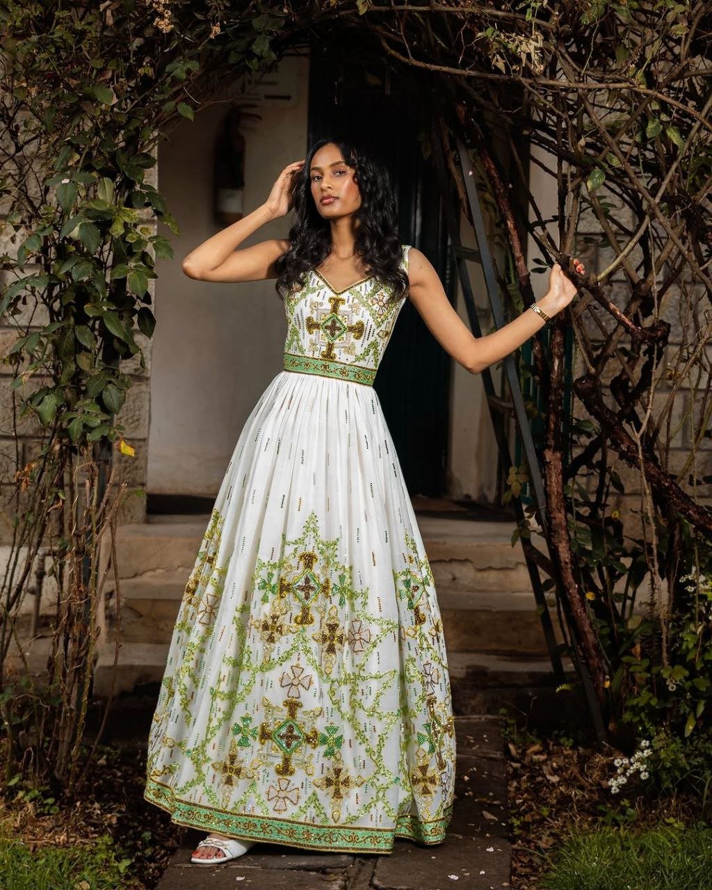 Elegant Sleeveless Green and Gold Habesha Wedding Dress with Modern Ethiopian Style M Elegant Sleeveless Green and Gold Habesha Wedding Dress with Modern Ethiopian Style M