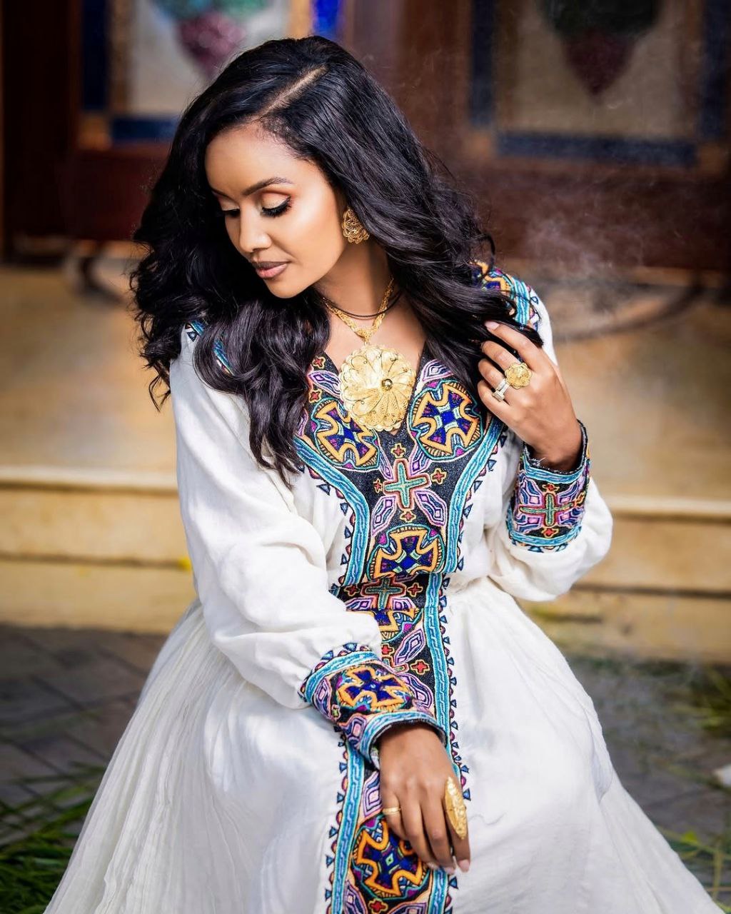 Elegant Habesha Dress with Bold Blue Embroidery for Church Ceremonies and Cultural Events