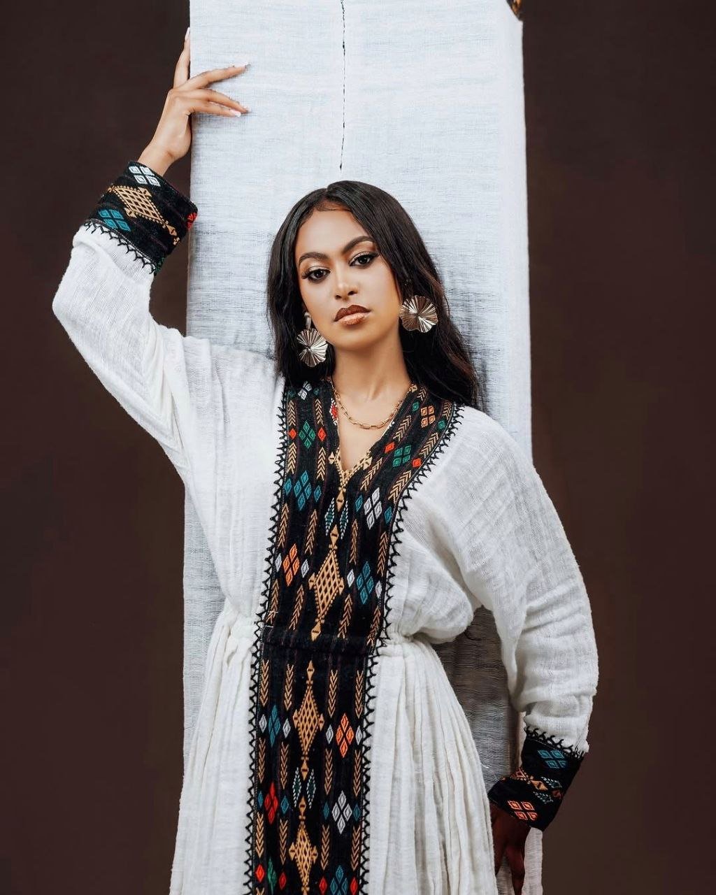 Bold Habesha Dress with Black and Multicolor Embroidery for Traditional Cultural Events