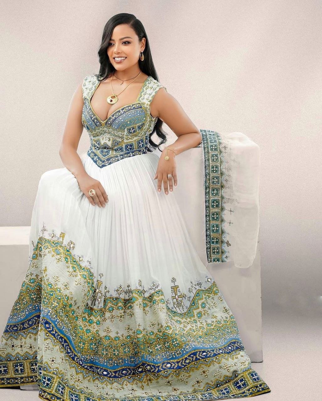 Elegant Habesha Kemis with Gold, Green and Sea Blue Details for Wedding and Events