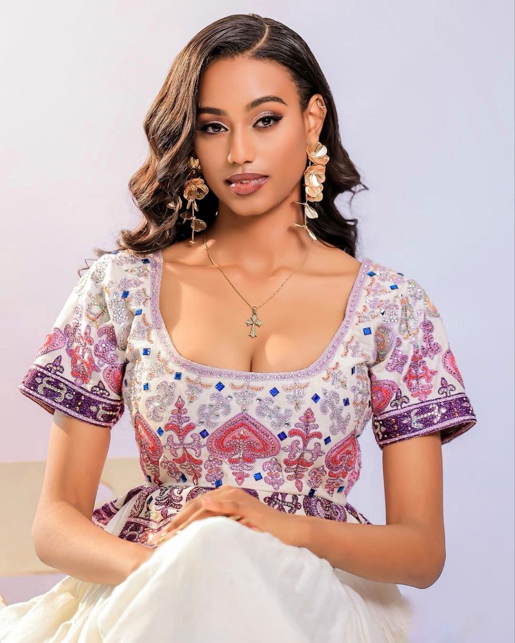 Elegant Habesha Kemis with Pink and Plum Embroidery for Wedding Celebrations
