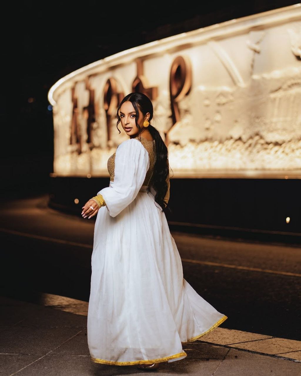Vibrant Gold Bodice Habesha Dress with Flowing Skirt for an event