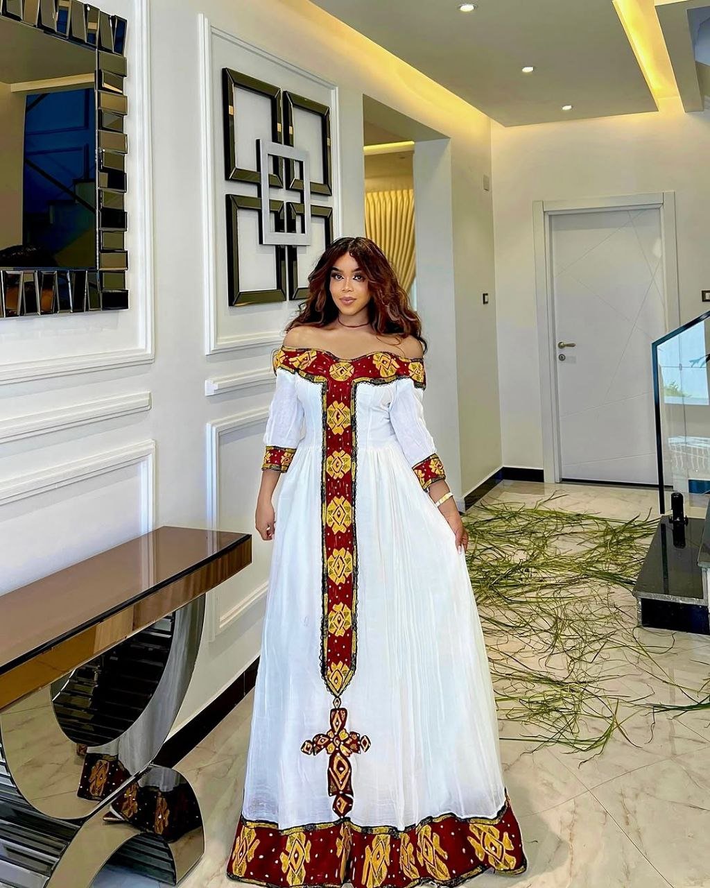 Elegant Off-Shoulder Habesha Dress with Bold Red Tilf Modern Ethiopian Dress for Festive Occasions