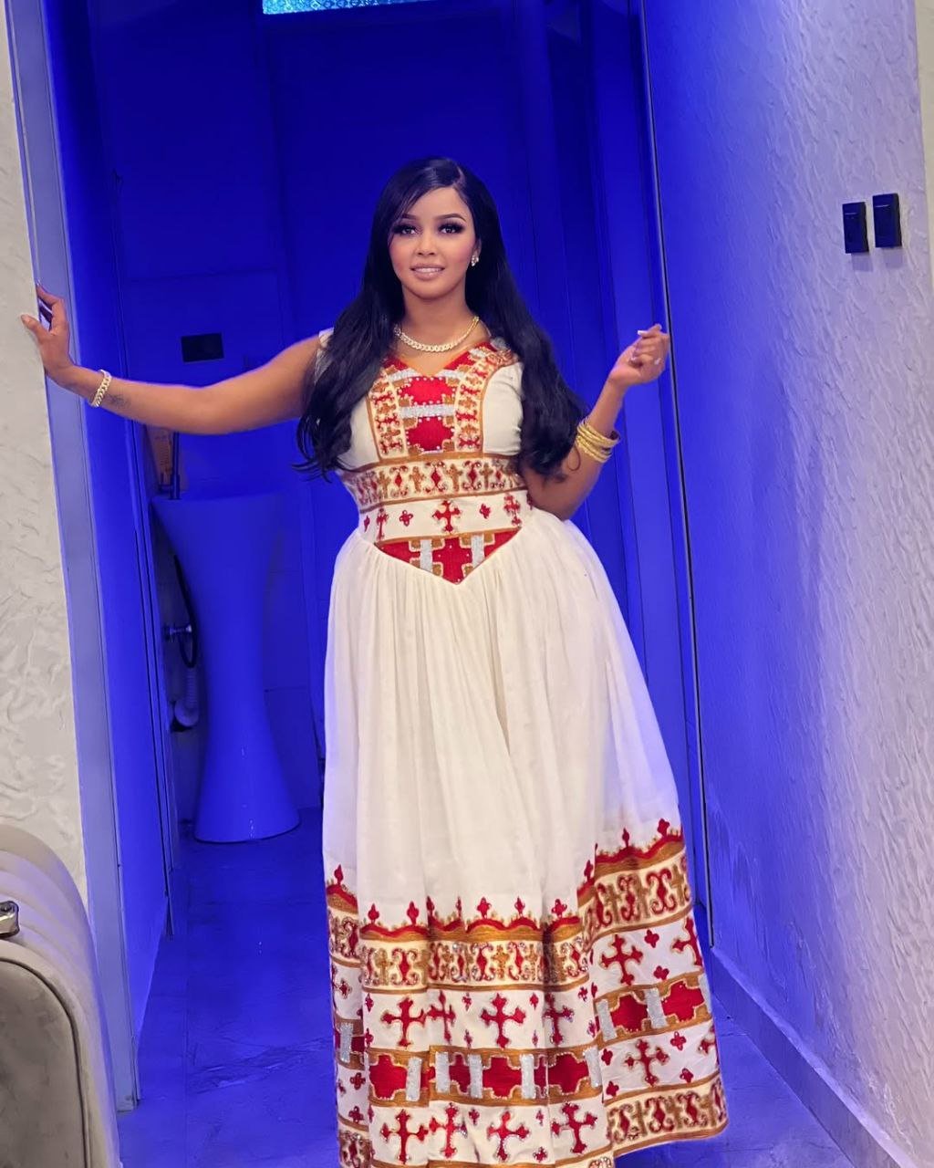 Beautiful Sleeveless Habesha Dress with Intricate Red and Gold Design Ethiopian Dress For Weddings.