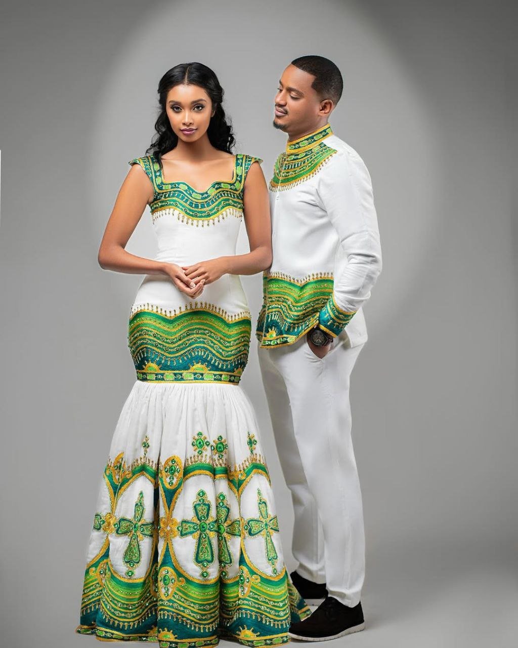 Elegant Green and Gold Habesha Couple Outfit for Weddings and Celebrations