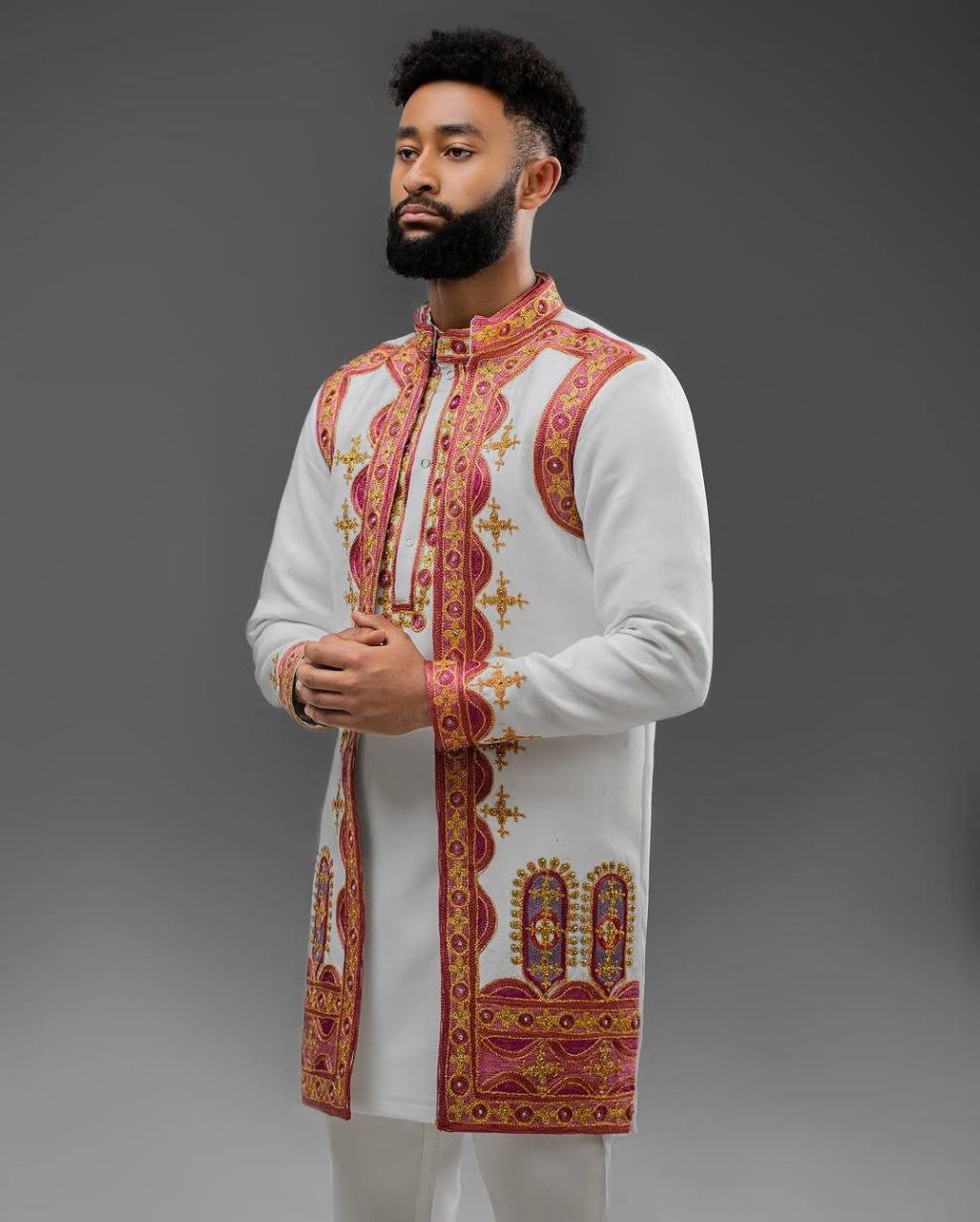 Elegant Habesha Wedding Dress with Red and Gold Embroidery: Traditional Ethiopian Clothing for Couples