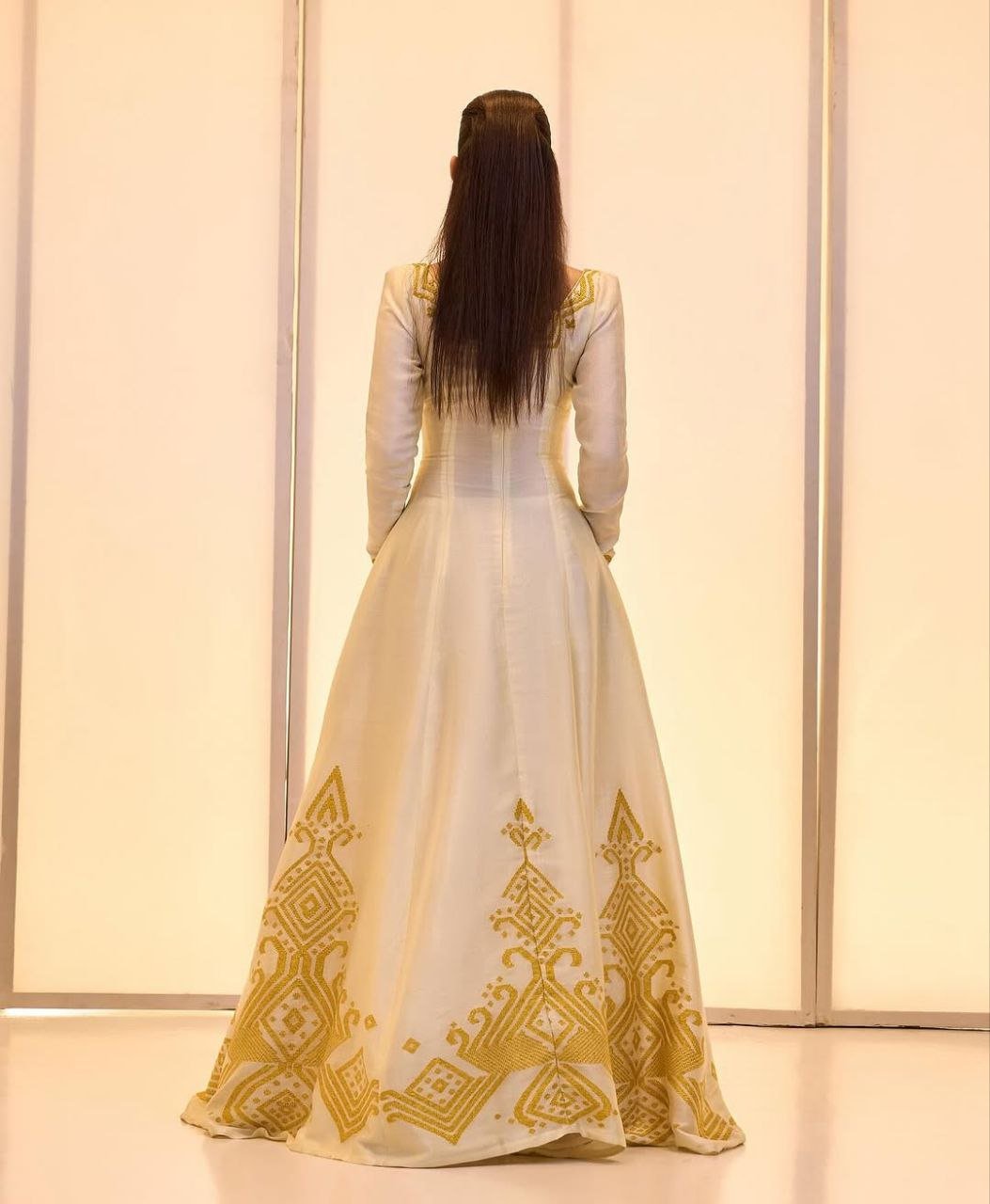Elegant Ivory Habesha Wedding Dress with Intricate Gold Embroidery For Wedding