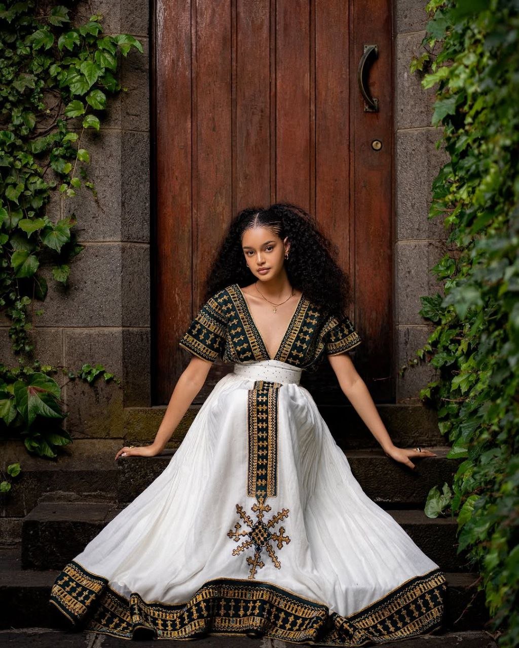 Elegant Traditional Ethiopian Dress with Rich Green and Gold Embroidery for Cultural Celebrations