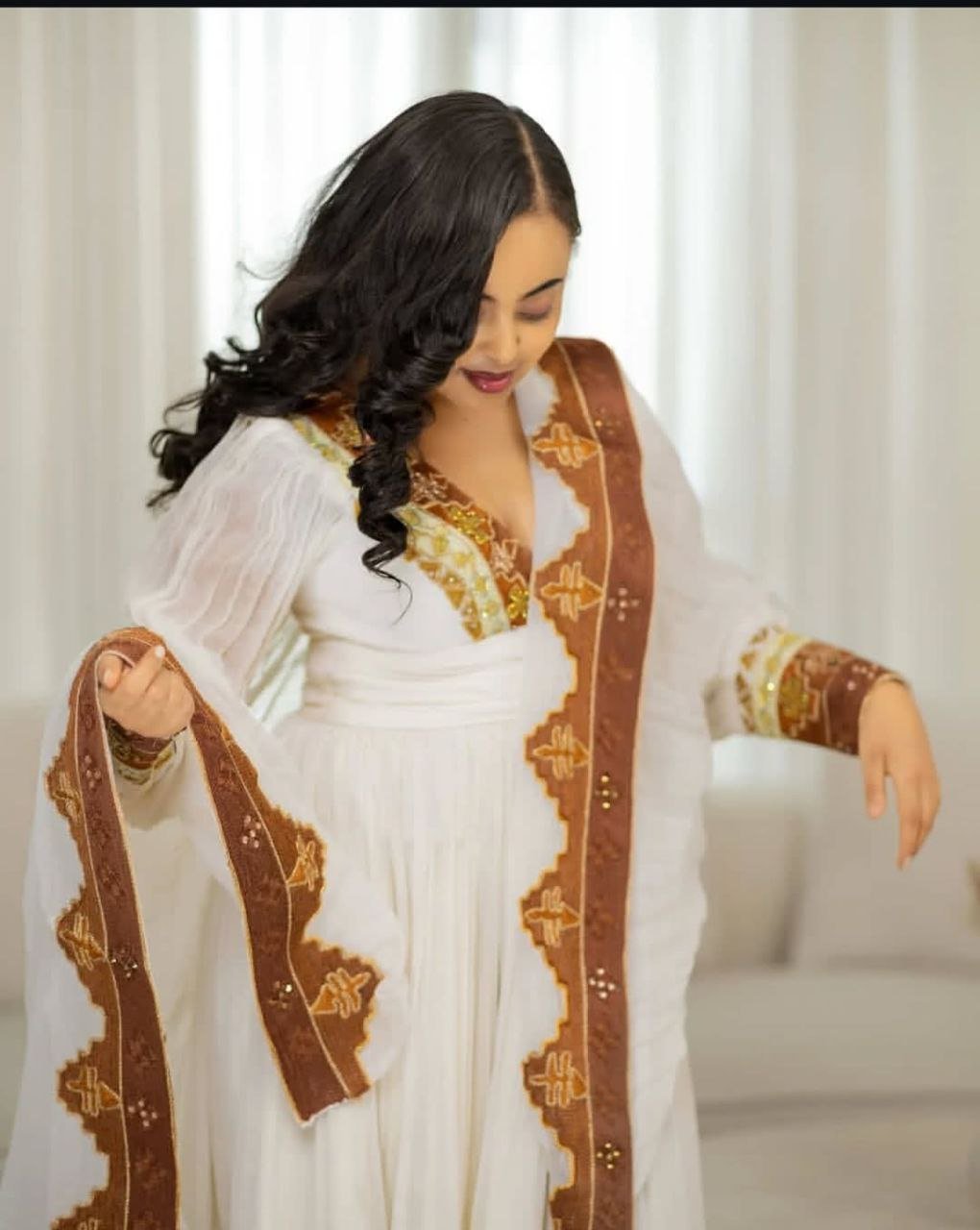 Stunning Habesha Dress with Luxurious Gold Embroidery for Weddings