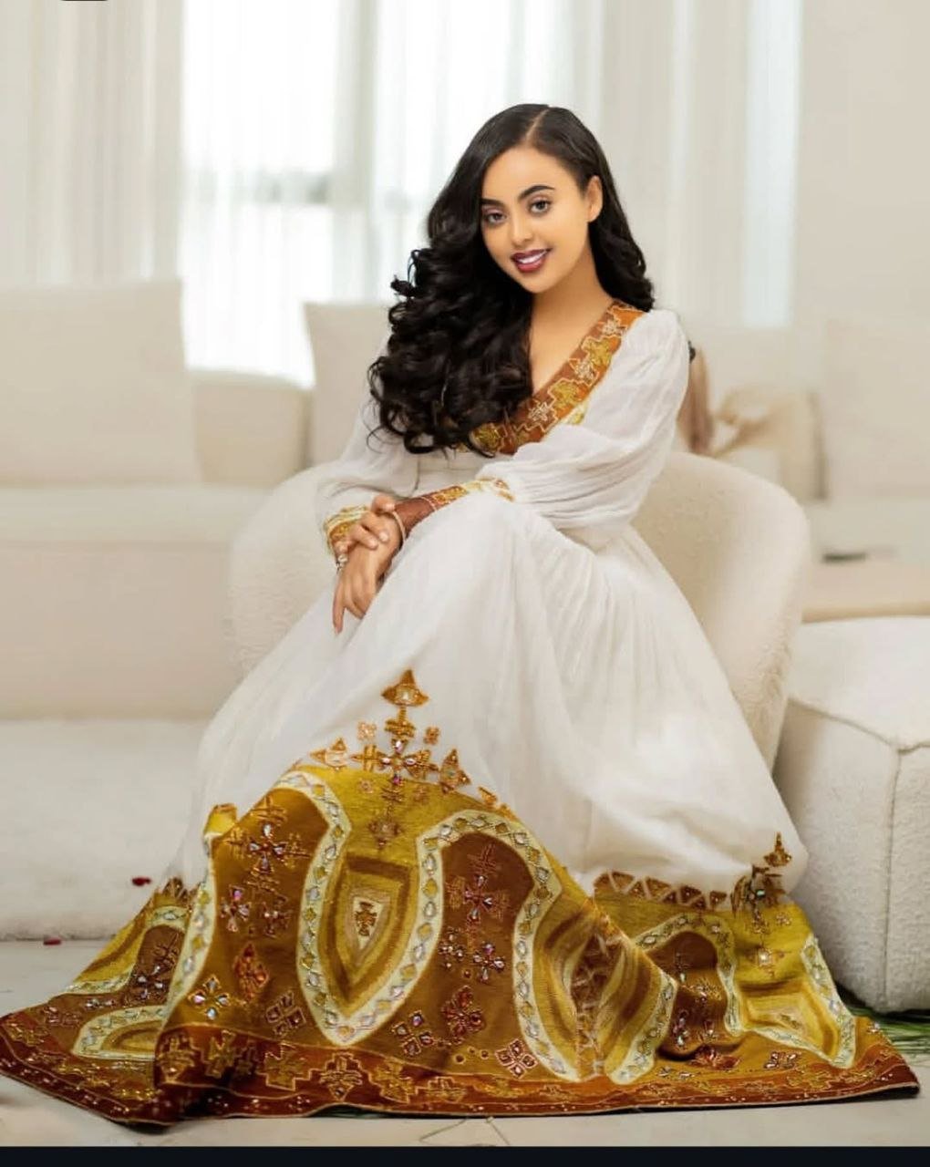 Stunning Habesha Dress with Luxurious Gold Embroidery for Weddings