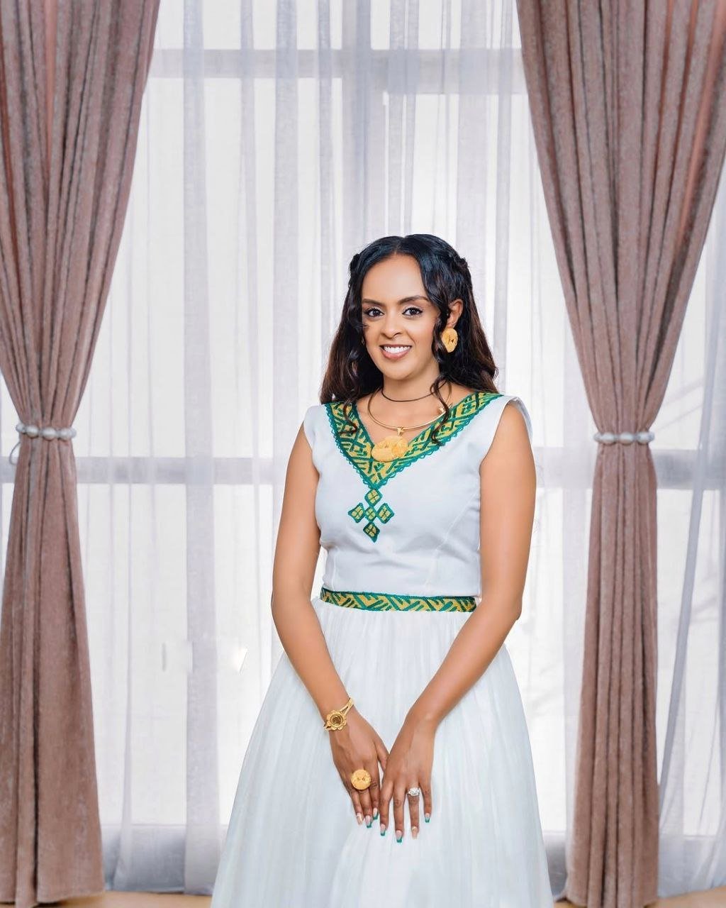 Elegant Habesha Wedding Dress with Stunning Green Embroidery For Celebration