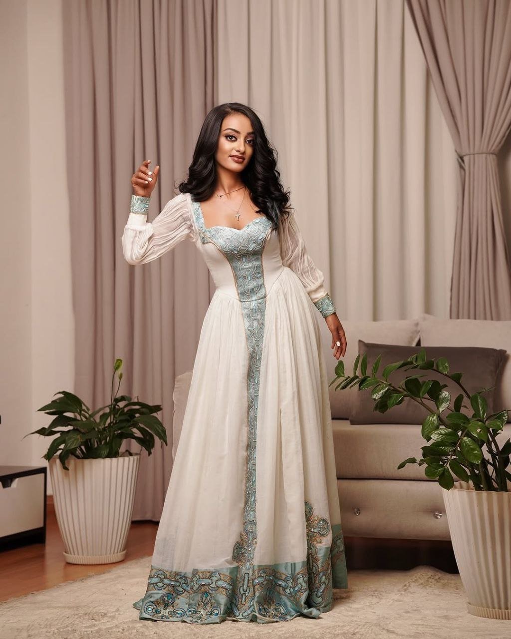 Elegant Habesha Dress with Aqua Blue Embroidery for Special Occasions