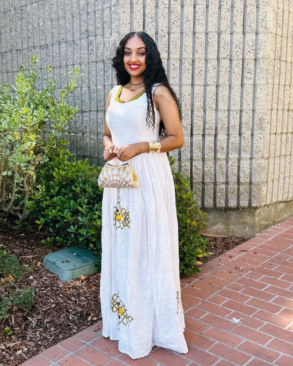 Simple Habesha Dress with Vibrant Yellow Embroidery a Choice for Everyday wear