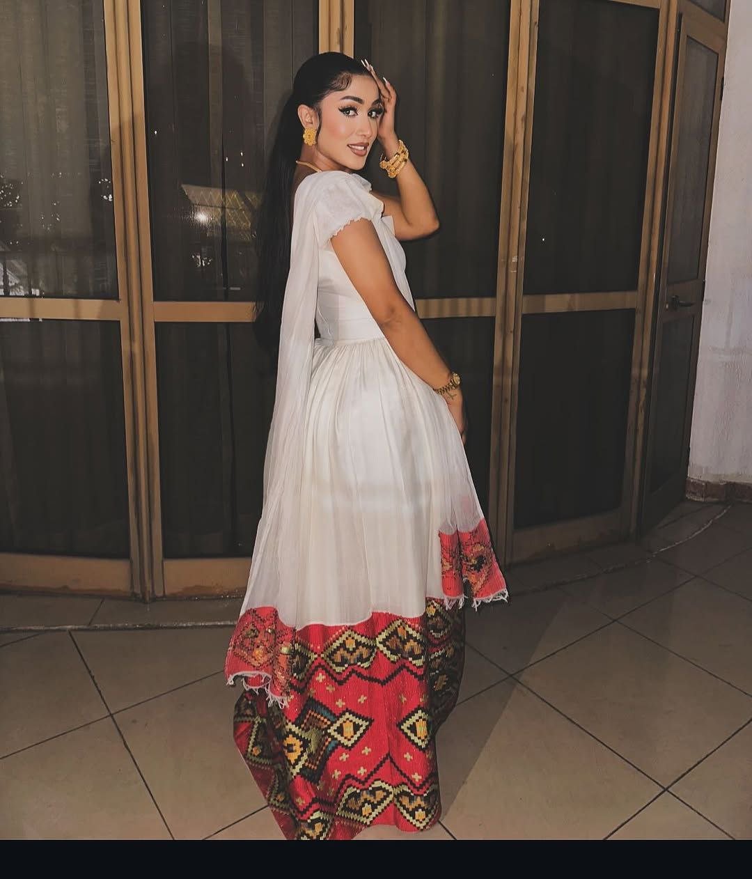 Elegant Habesha Dress with Intricate Waist Embroidery for Striking Cultural Elegance