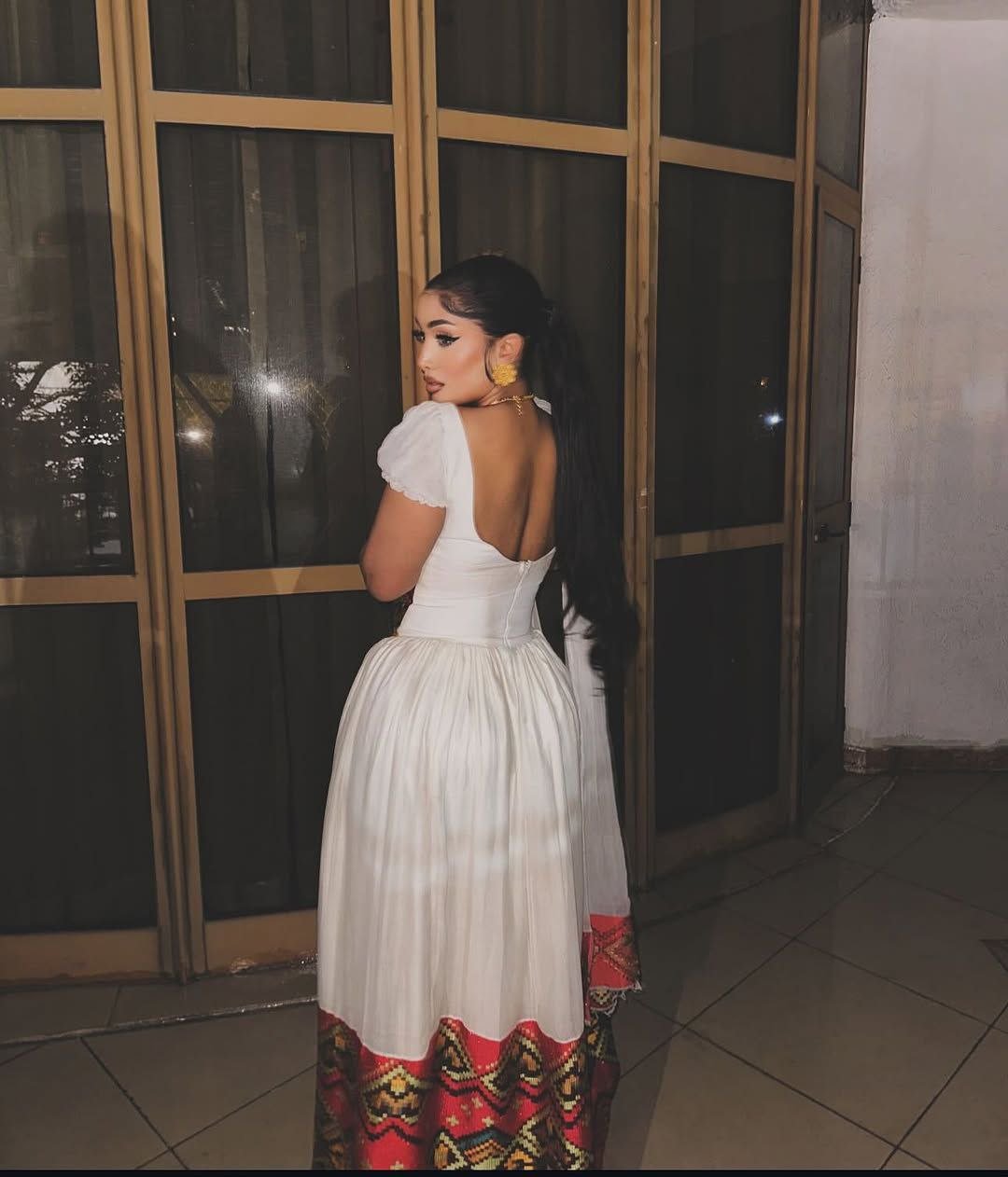 Elegant Habesha Dress with Intricate Waist Embroidery for Striking Cultural Elegance