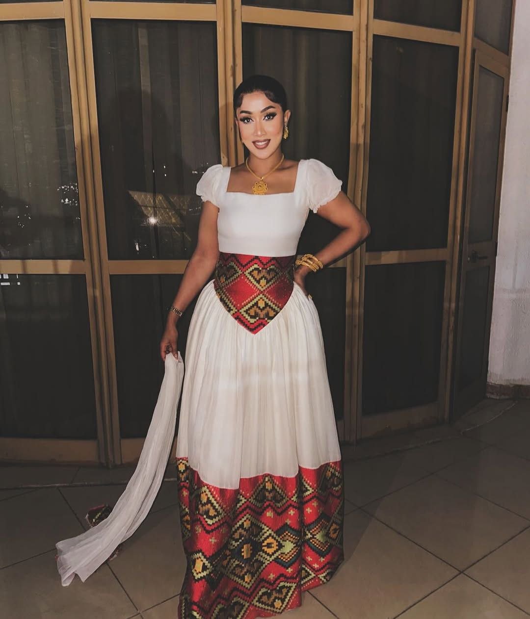 Elegant Habesha Dress with Intricate Waist Embroidery for Striking Cultural Elegance