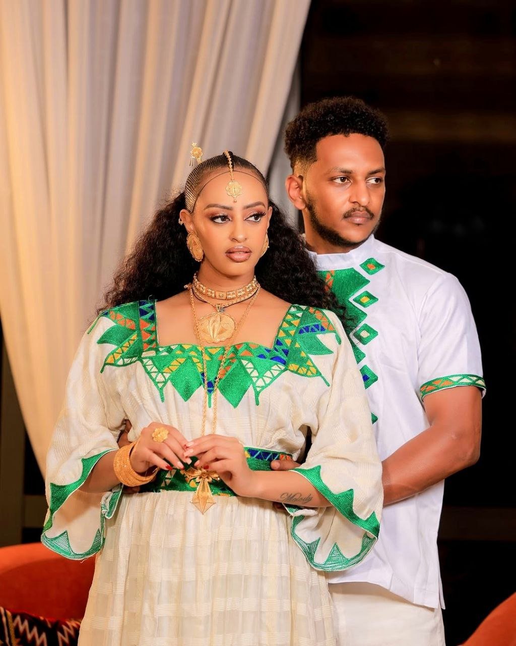 Beautiful Habesha Couple’s Outfit with Elegant Green Embroidery a Perfect Choice for Celebrations