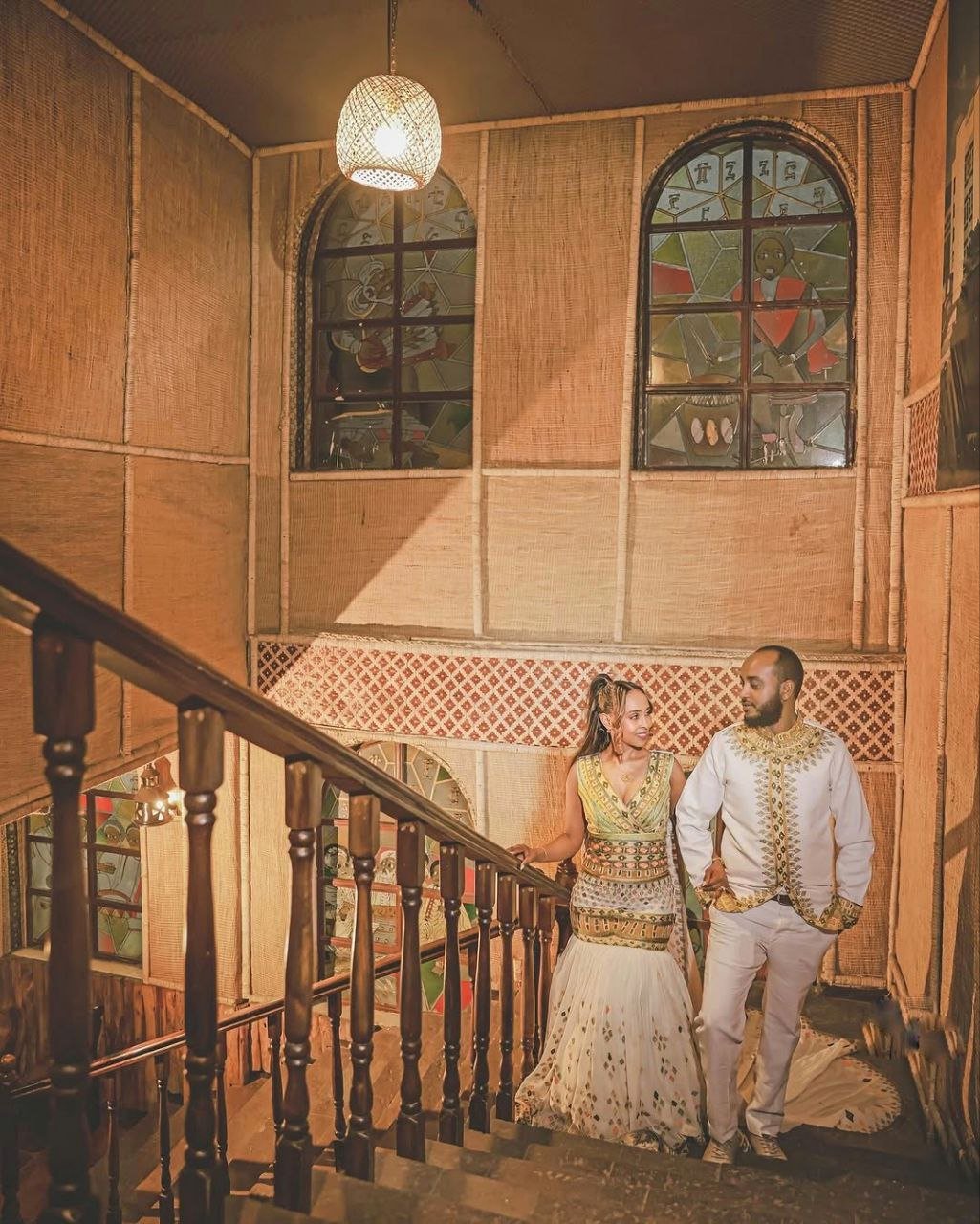Regal Traditional Habesha Couples Attire with Flowing Veil for Wedding
