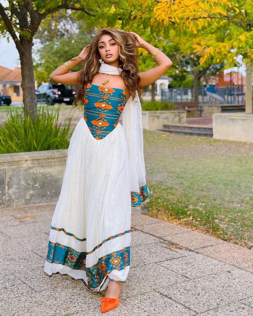Modern Habesha Kemis with Teal and Orange Patterns β Habesha Clothing β Habesha Dress β Ethiopian Traditional Clothing