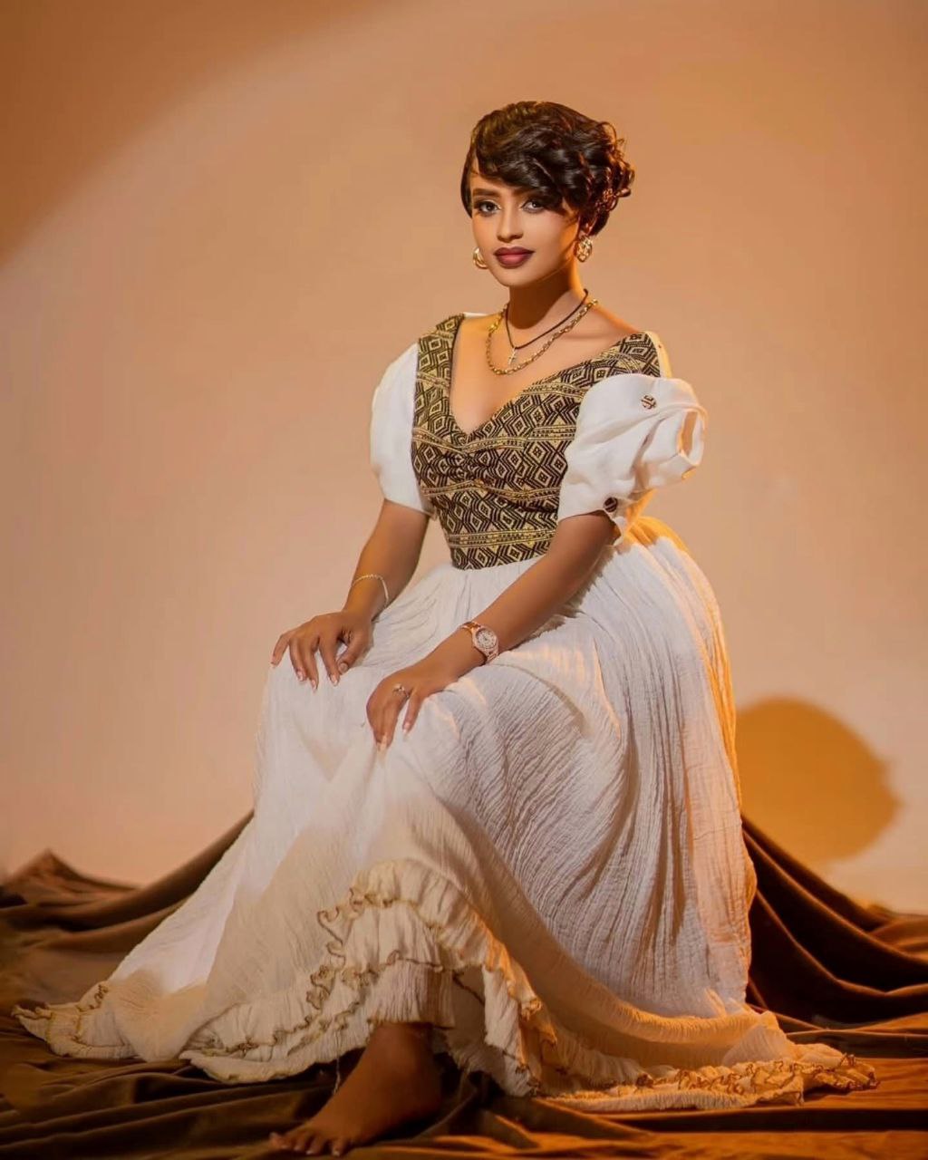 Simple Habesha Kemis with Gold Embroidery for Special Occasions