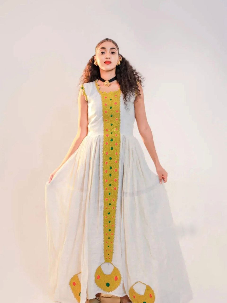 Vibrant Ethiopian Habesha Dress with Yellow & Multicolor Detailing