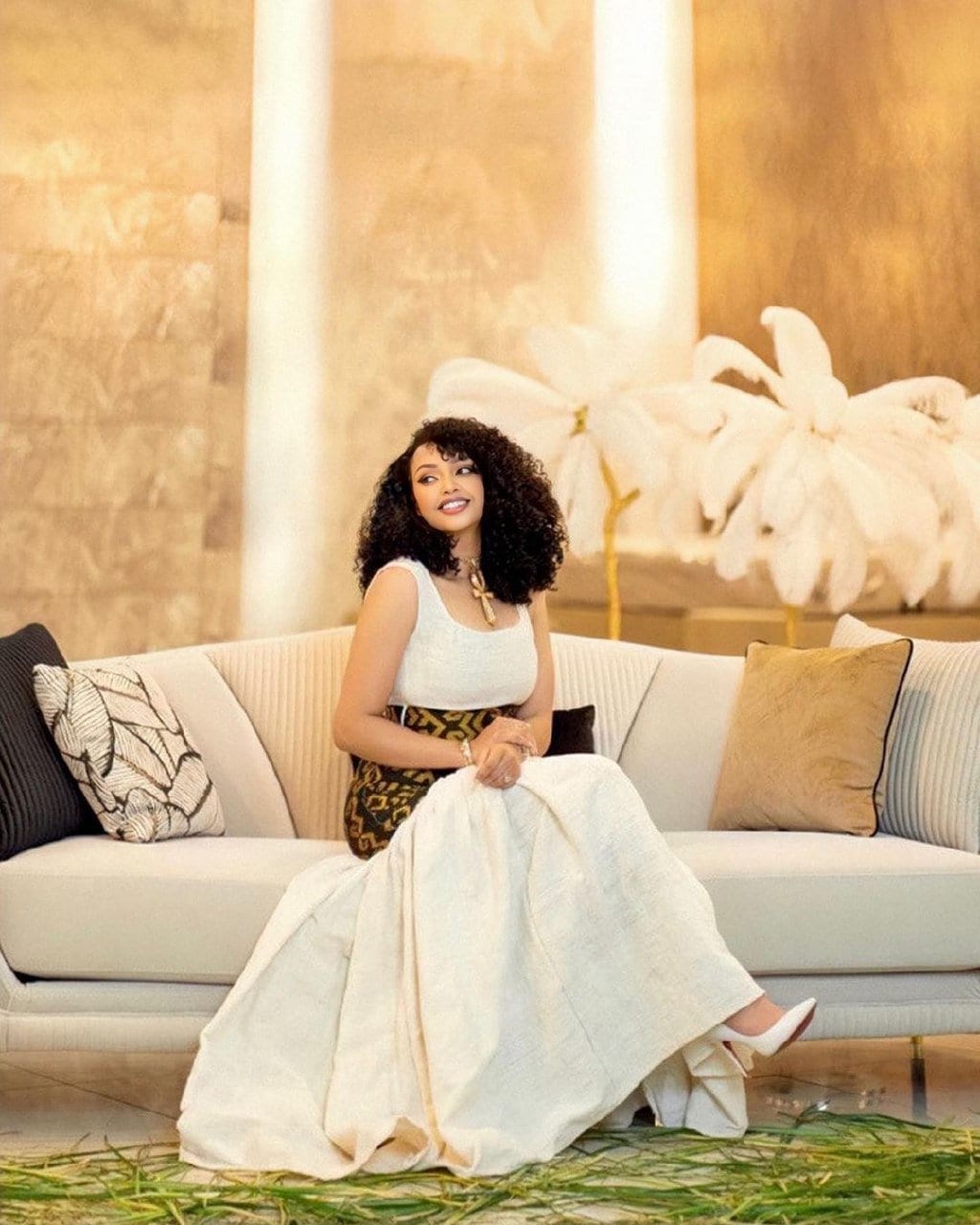 golden design shape fetil habesha dress sitting view