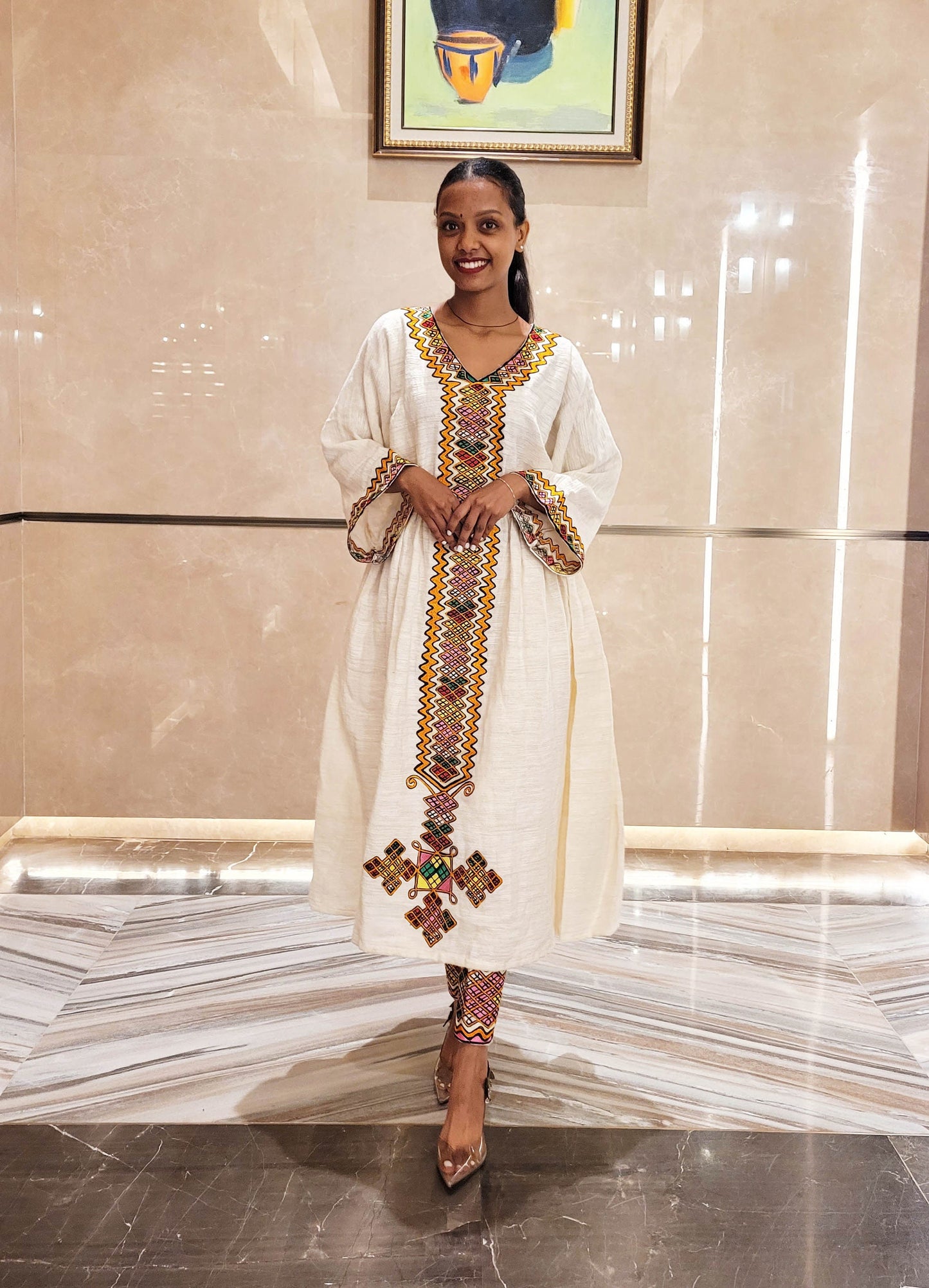 Vibrant Elegance: Pink and Orange Embroidered Habesha Dress – Celebrate Ethiopian & Eritrean Culture with this Stunning Masterpiece