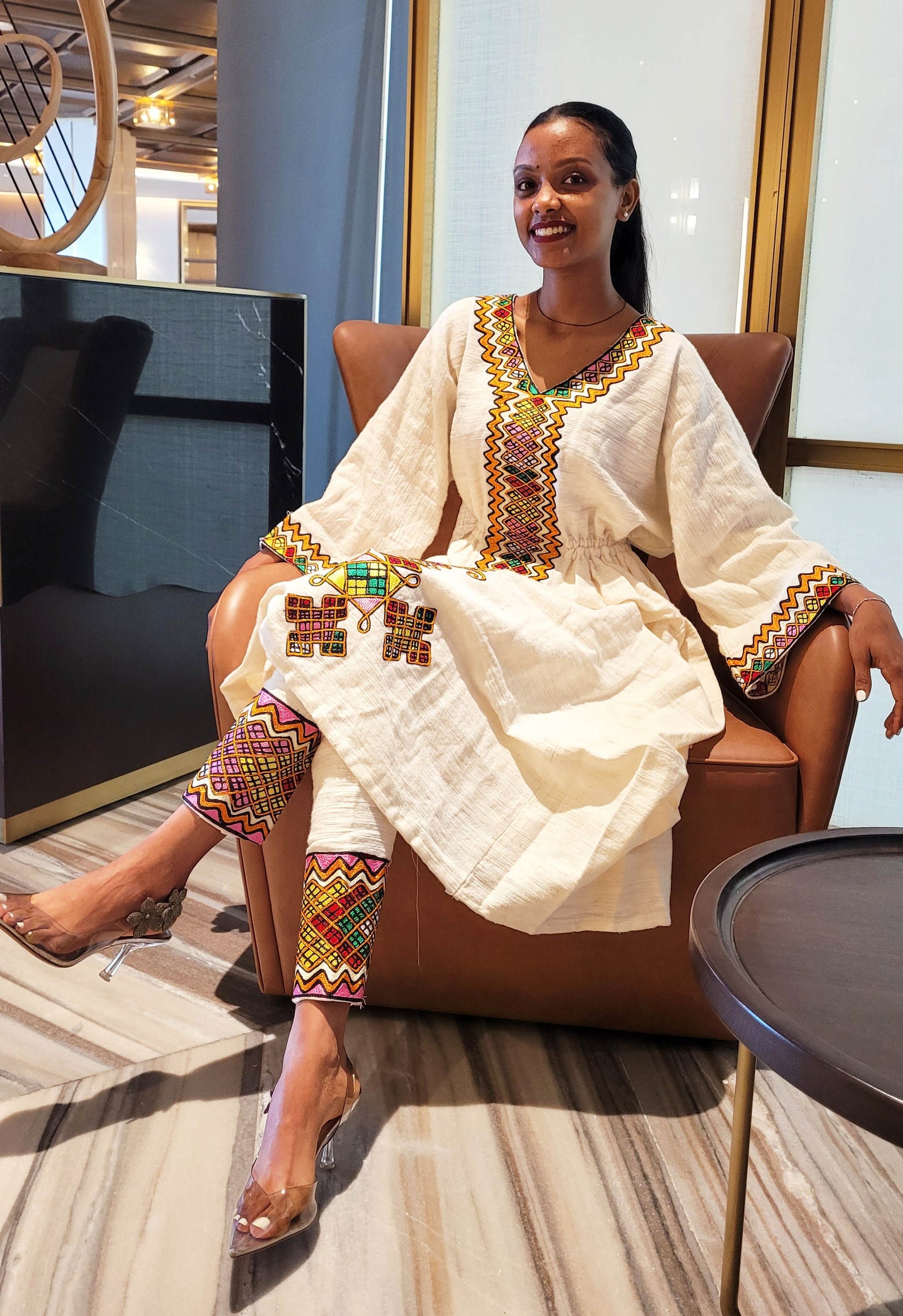 Vibrant Elegance: Pink and Orange Embroidered Habesha Dress – Celebrate Ethiopian & Eritrean Culture with this Stunning Masterpiece