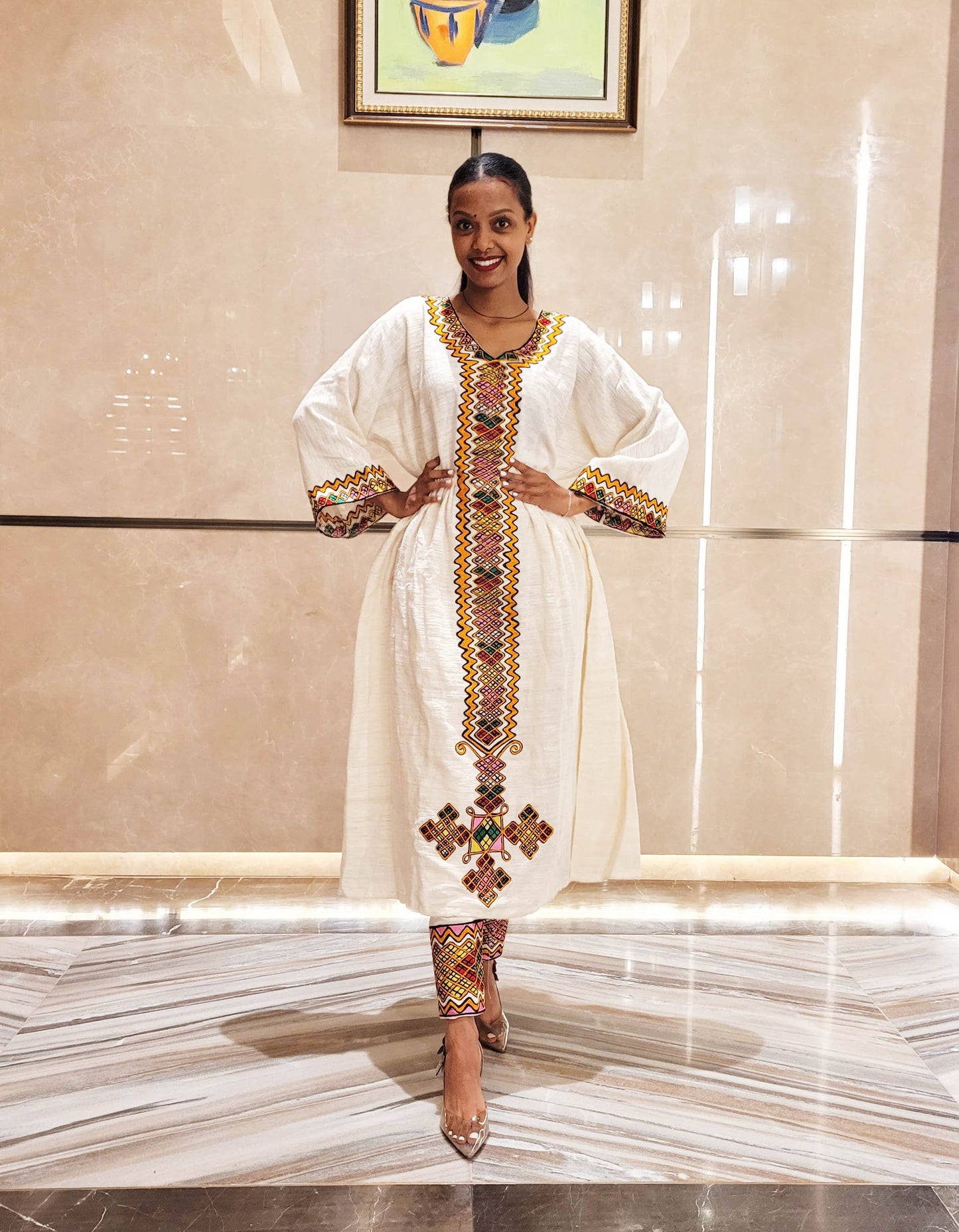 Vibrant Elegance: Pink and Orange Embroidered Habesha Dress – Celebrate Ethiopian & Eritrean Culture with this Stunning Masterpiece