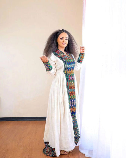 Darker Design in Traditional Habesha Couples Outfit Style Elegant Habesha Couples Outfit