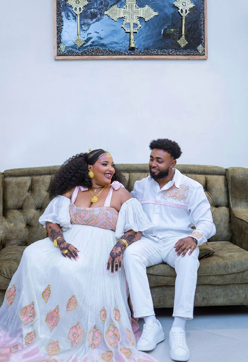 Elegant Light Pink Habesha Couples Outfit with Beautiful Design Ethiopian Couples Outfit