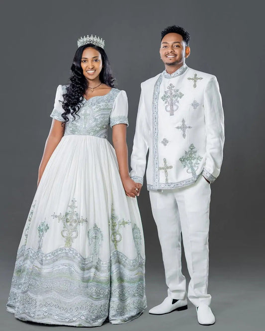 Sophisticated Silver and Blue Habesha Couple's Outfit