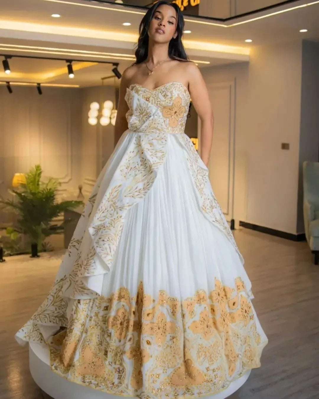 Off-Shoulder Habesha Bridal Dress: Crystal Embellishments & Flowing Train