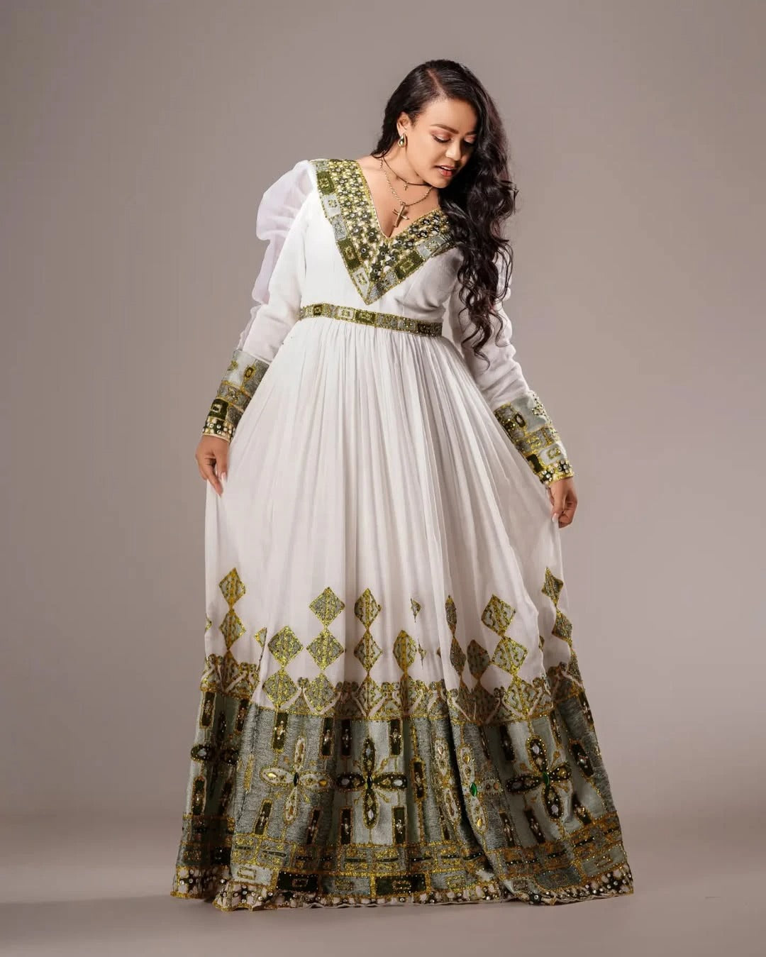 Classy Light Green Habesha Kemis with Golden Patterns