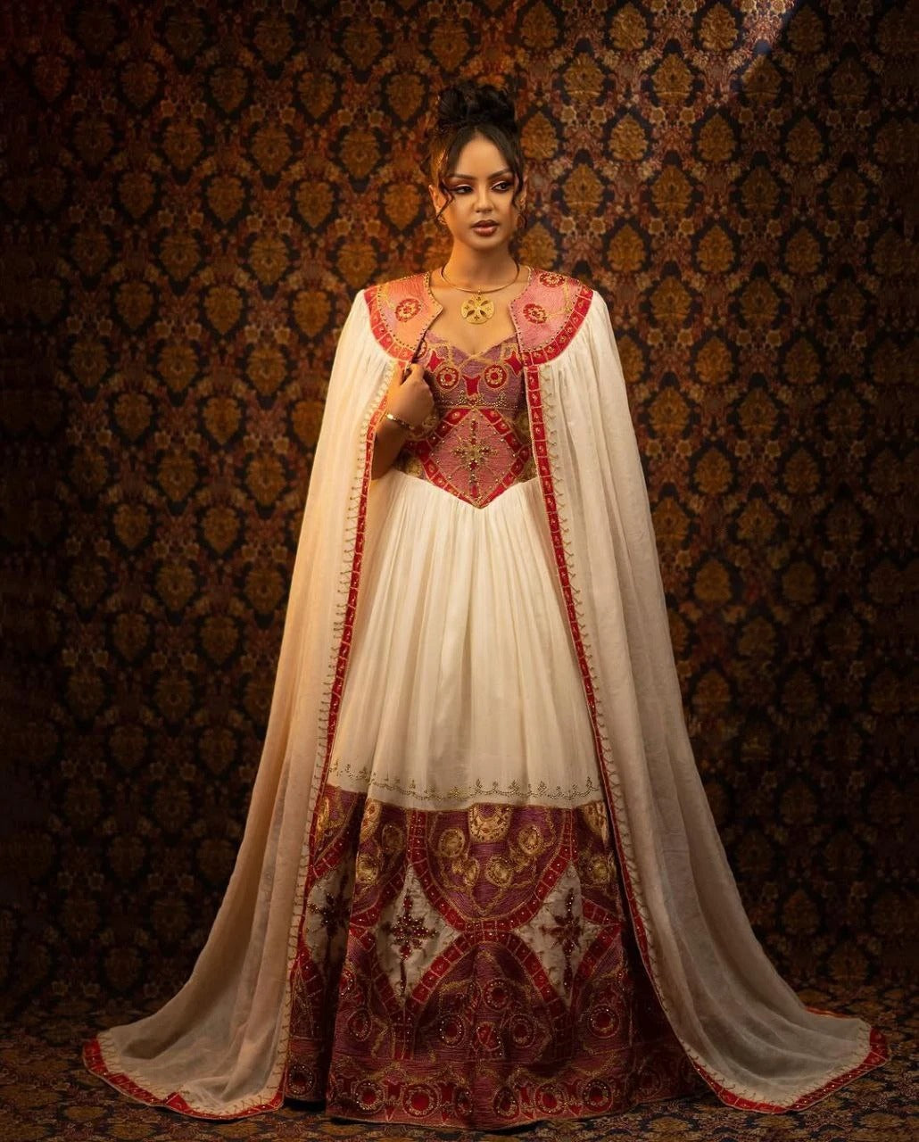 Glamorous Traditional Ethiopian Dress with Gold, Rich Red and Soft Pink Embroidery for Stunning Weddings