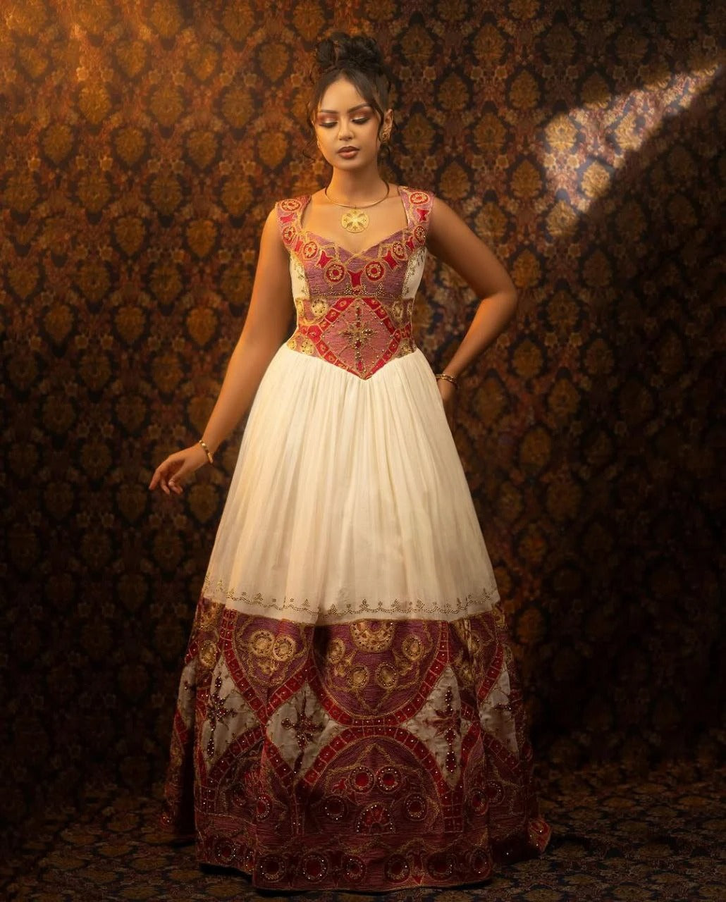Glamorous Traditional Ethiopian Dress with Gold, Rich Red and Soft Pink Embroidery for Stunning Weddings