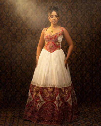 Glamorous Traditional Ethiopian Dress with Gold, Rich Red and Soft Pink Embroidery for Stunning Weddings