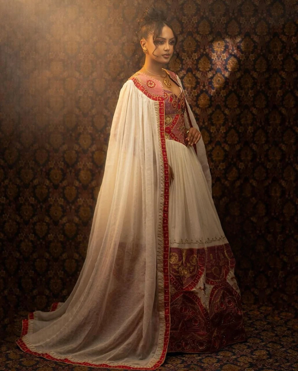 Glamorous Traditional Ethiopian Dress with Gold, Rich Red and Soft Pink Embroidery for Stunning Weddings