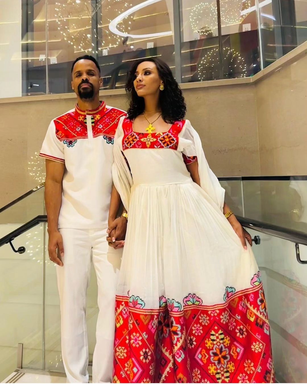 Passionate Red Bliss: Vibrant Habesha Couples Outfit in Menen Fabric