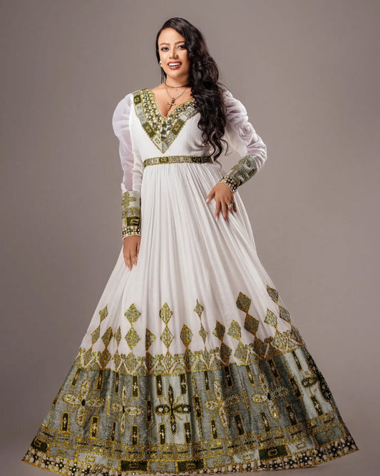 Classy Light Green Habesha Kemis with Golden Patterns 