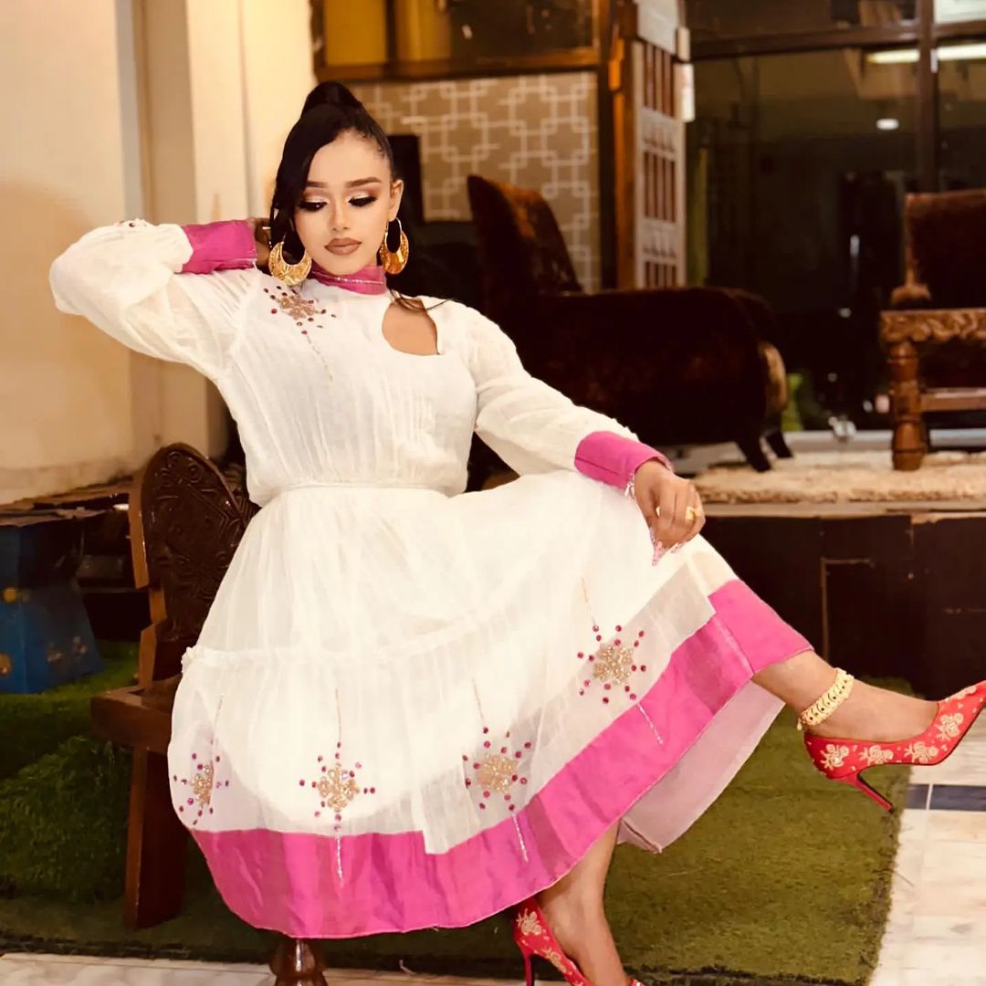 Appealing Sweet Pink Mini Habesha Dress: with Daring Cutout Ethiopian Traditional Modern Habesha Kemis