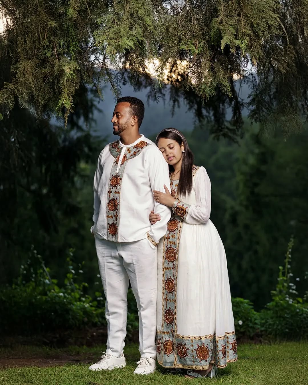 Fondling Love in Light Blue Habesha Couples Outfit